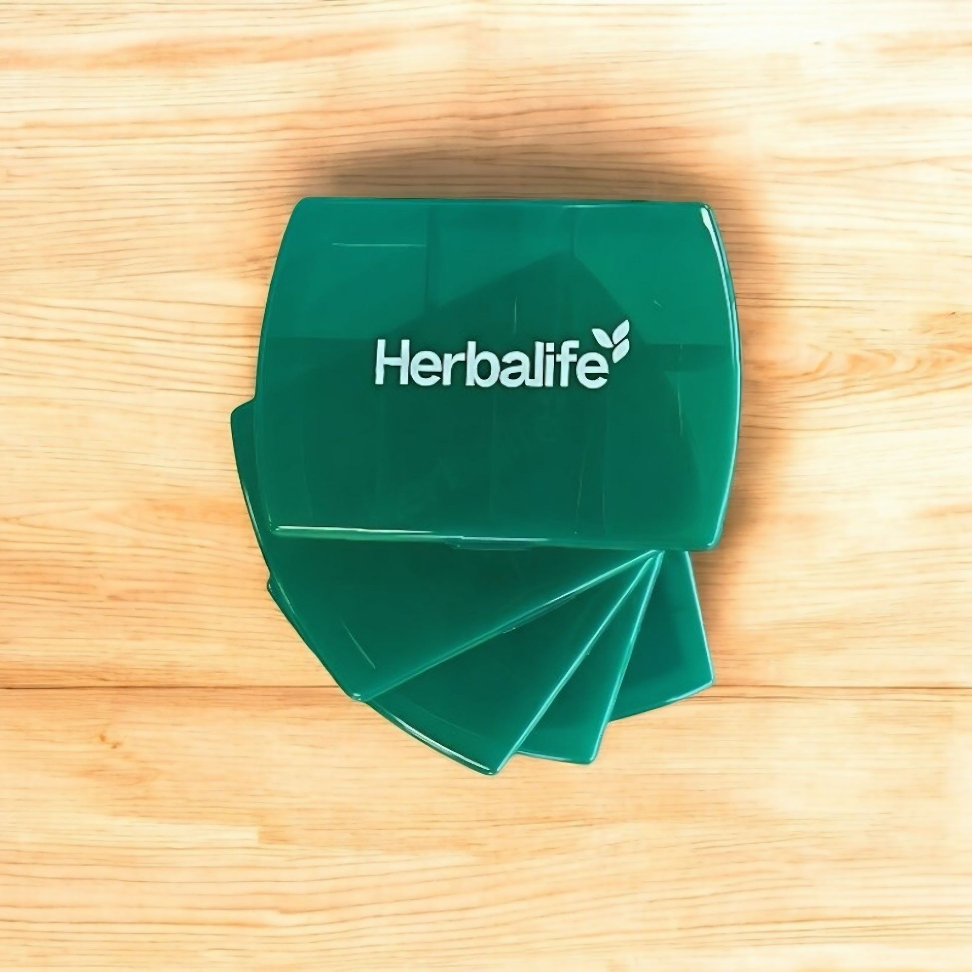 Herbalife Porta Compresse 2.0 portable pill organizer with multiple compartments for supplements and medication storage.