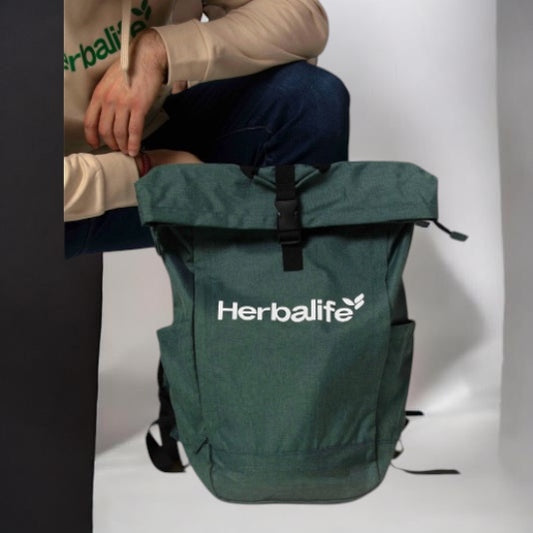 Herbalife Zaino scuola backpack with multiple compartments, black fabric, and adjustable straps, designed for students.